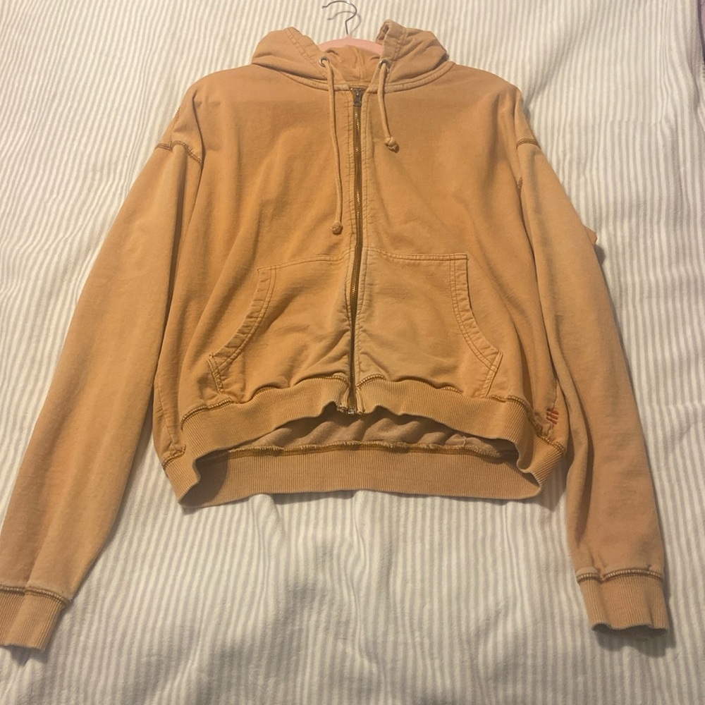 Orange zip-up